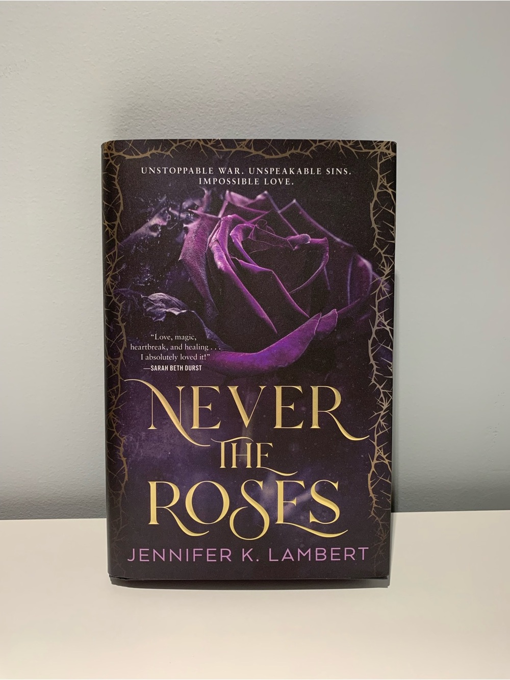 Never the Roses by Jennifer K.Lambert